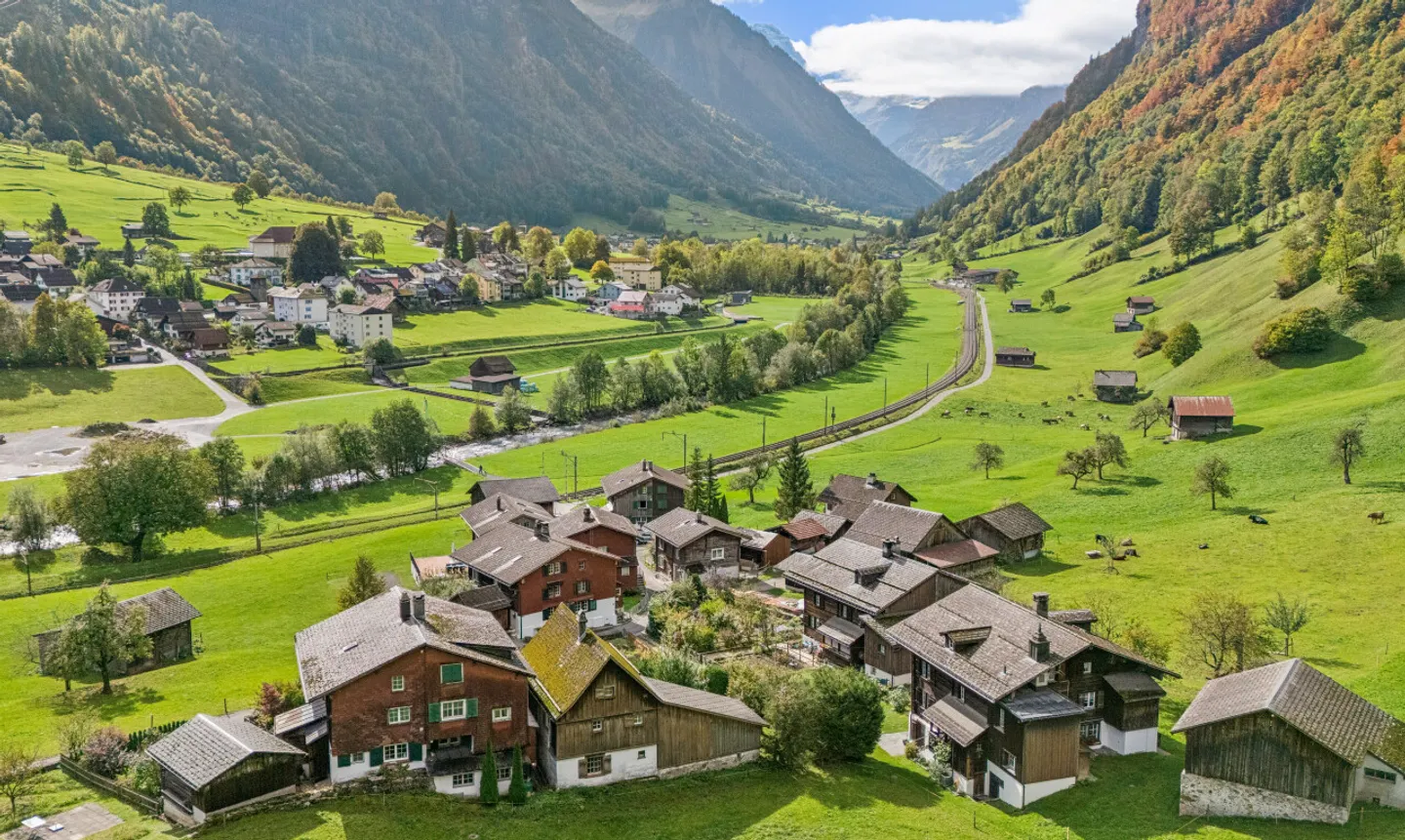 Two historic halves of a house with garden and mountain view in Luchsingen - Photo 1 of 13