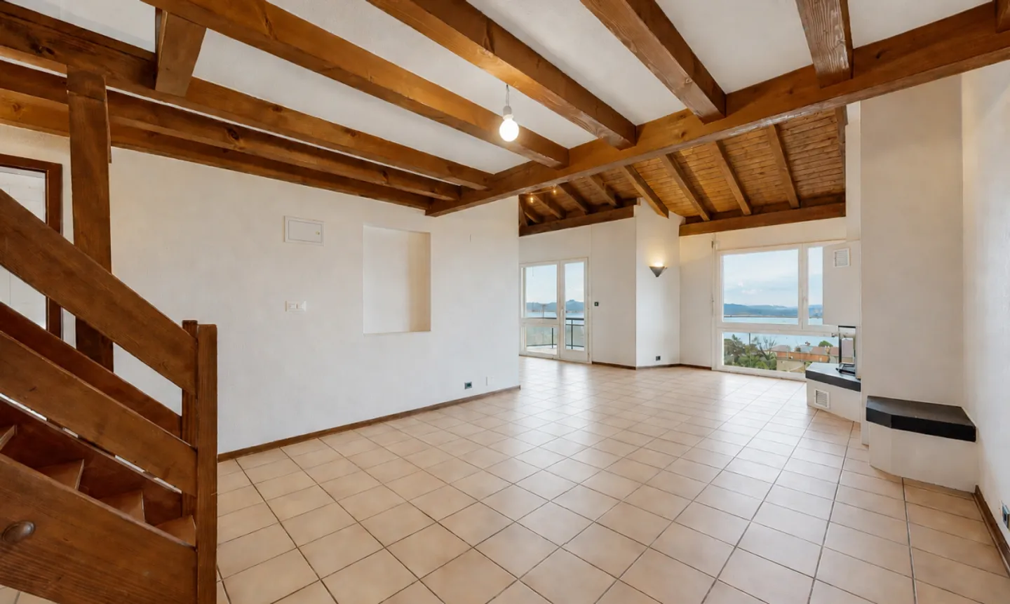 Appartement Dernier Étage avec Vue Lac - Photo 3 sur 13