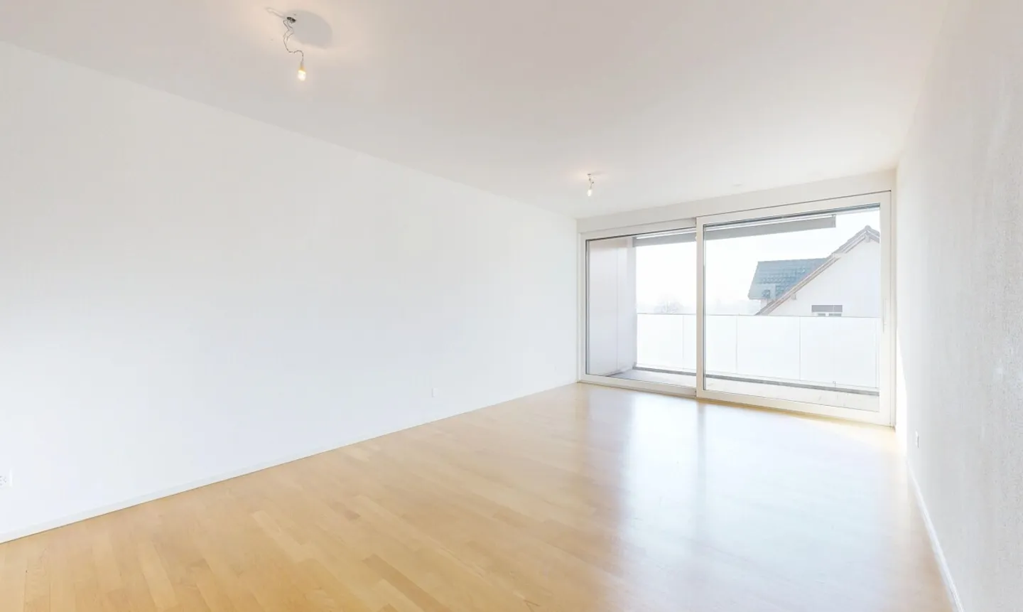 Appartamento moderno di 3,5 stanze con grande balcone e 2 posti auto - Foto 2 di 11