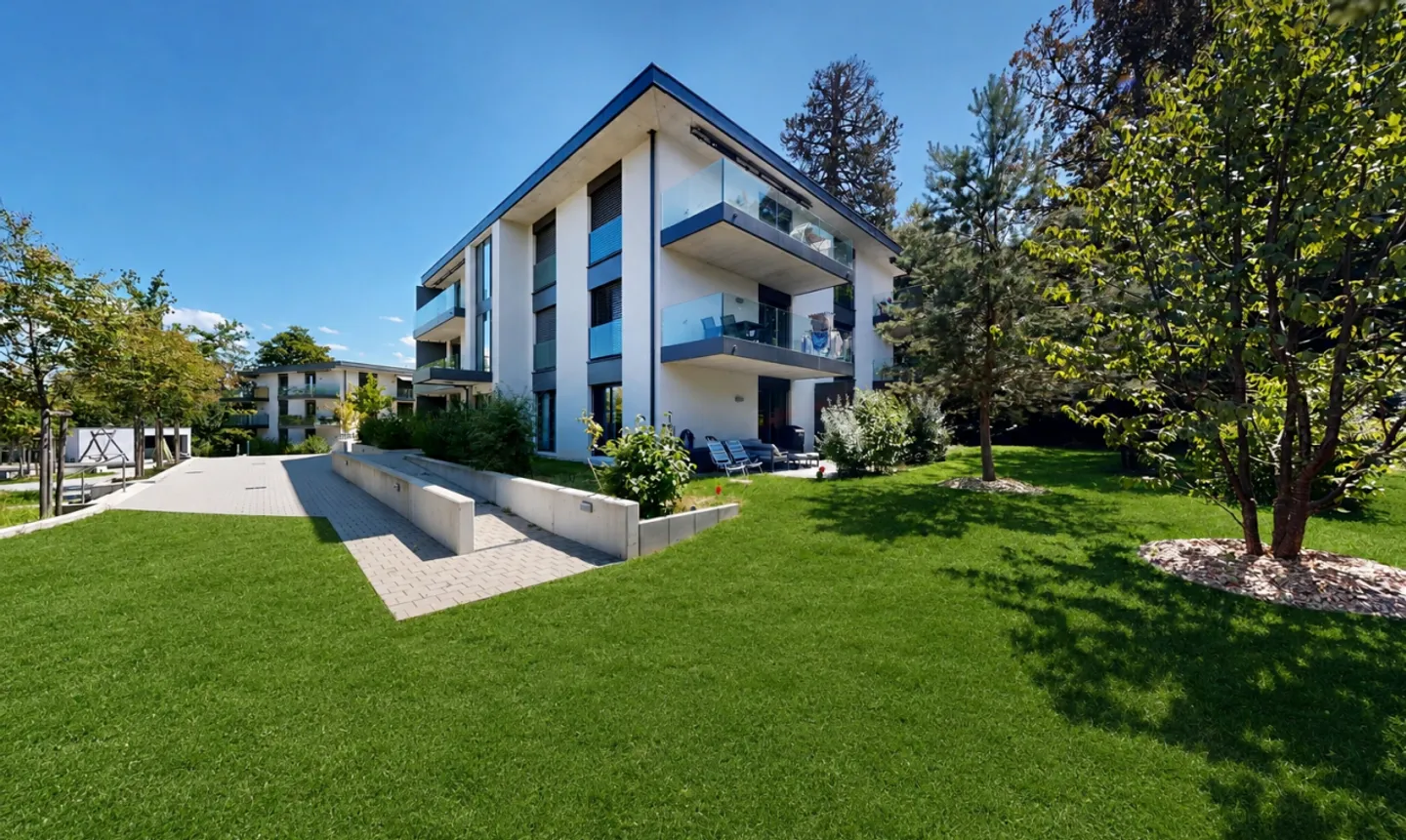 Eine moderne Gartenwohnung in privilegierter Lage in Chambésy - Foto 1 von 11
