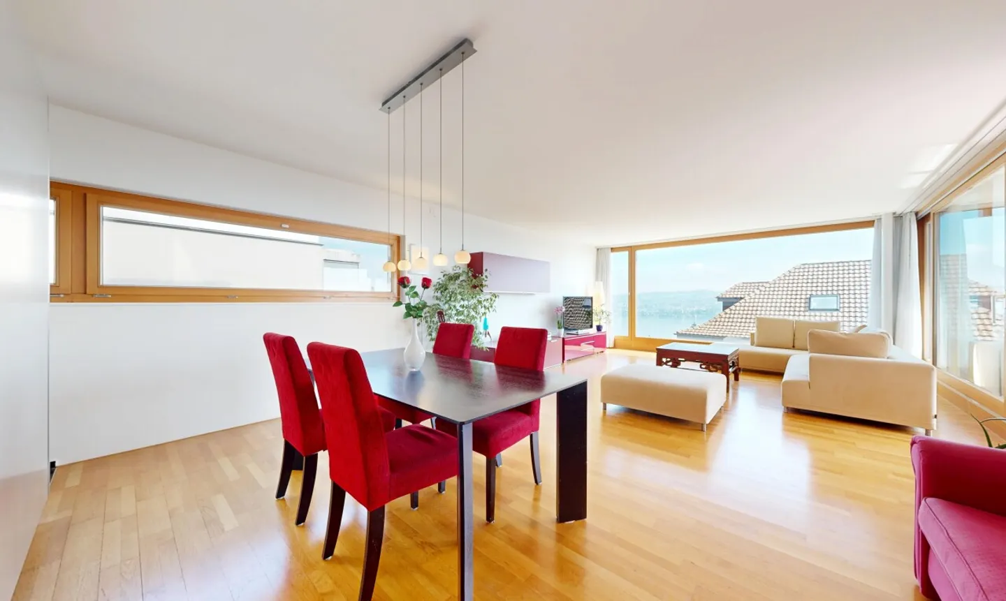 Appartement en terrasse lumineux de 5,5 pièces avec vue panoramique sur le lac - Photo 2 sur 11
