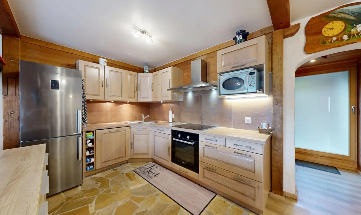 Spazioso appartamento con giardino privato vicino alle piste - Foto 4 di 11