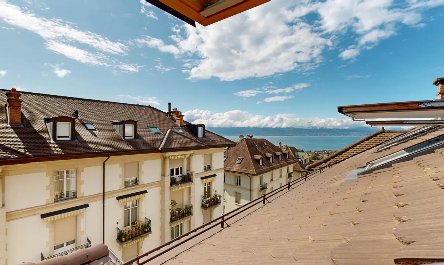 "Coup de coeur" Apartment - Top Floor in the Center of Lausanne - Photo 1 of 11
