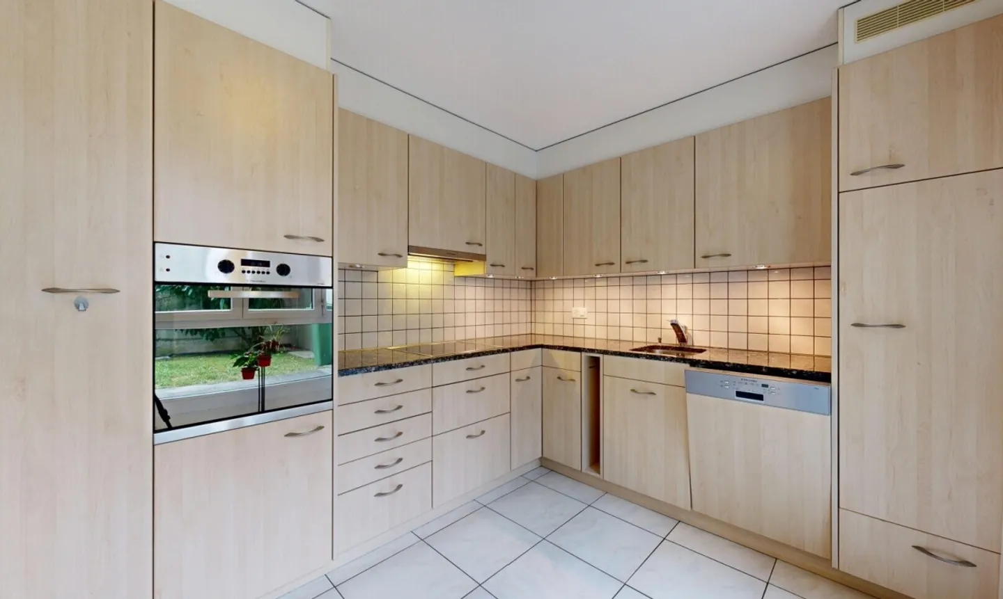Appartement familial de 4,5 pièces avec jardin - Photo 2 sur 11