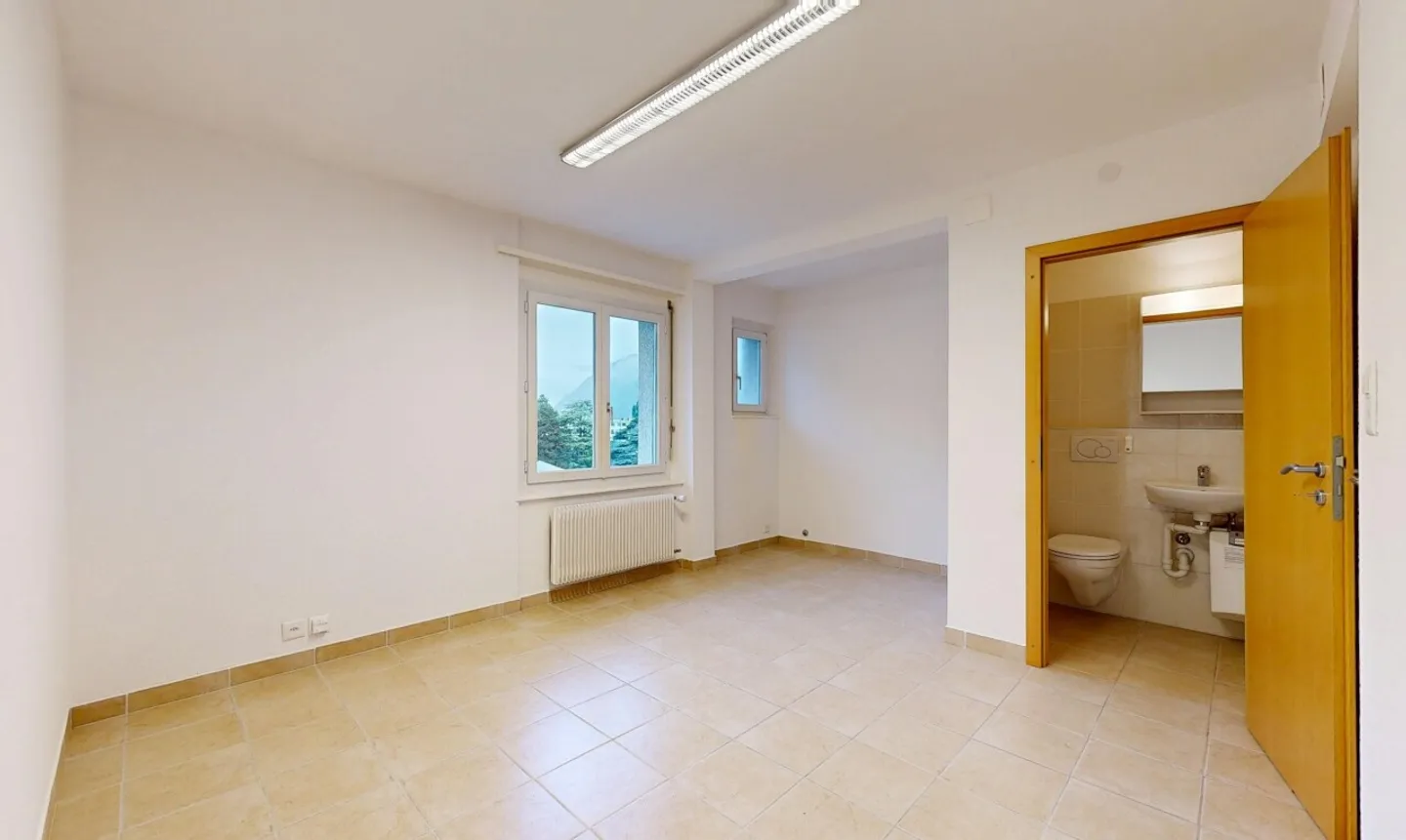 Bright commercial space in the heart of Martigny - Photo 10 of 11