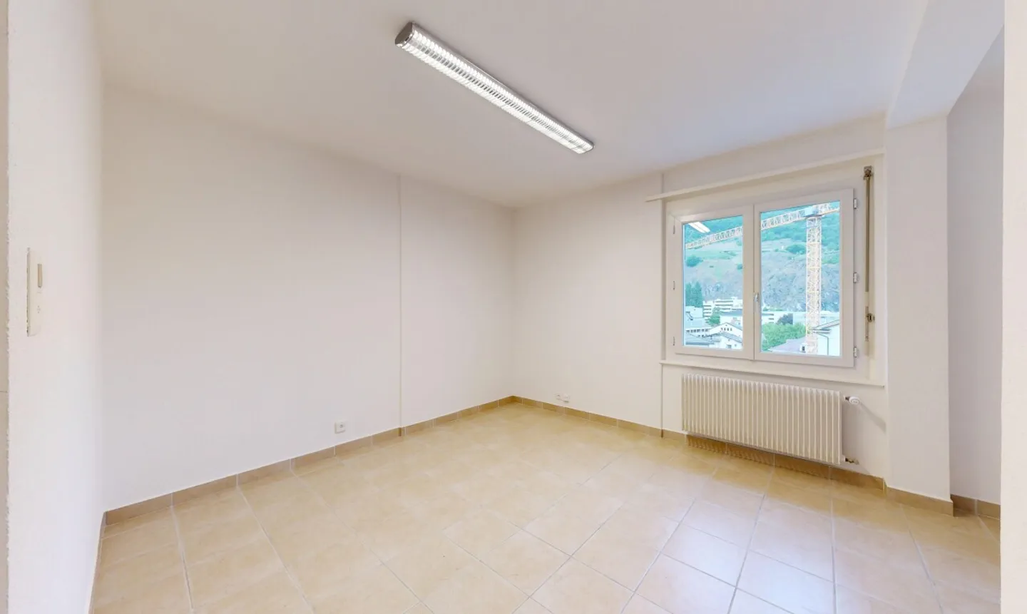 Bright commercial space in the heart of Martigny - Photo 9 of 11