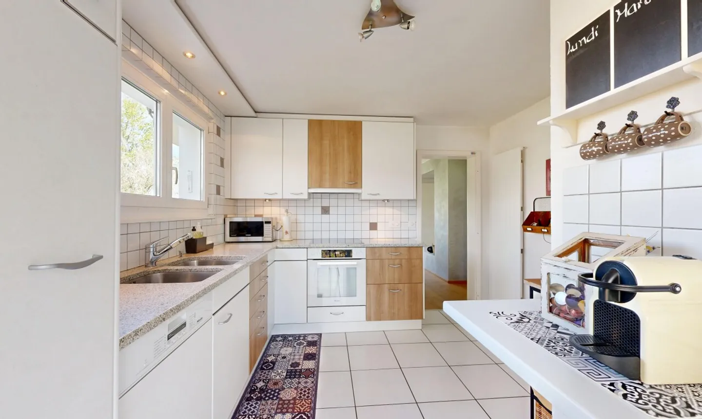 Serene Frame and Exceptional Brightness for this Family Home - Photo 4 of 11