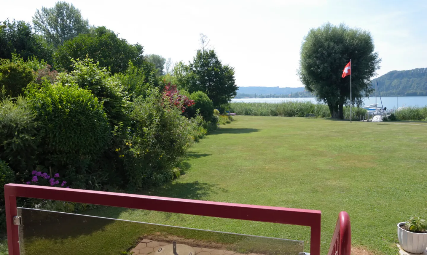 Duplex-Gartenwohnung direkt am See mit eigenem Bootsplatz - Photo 1 of 11