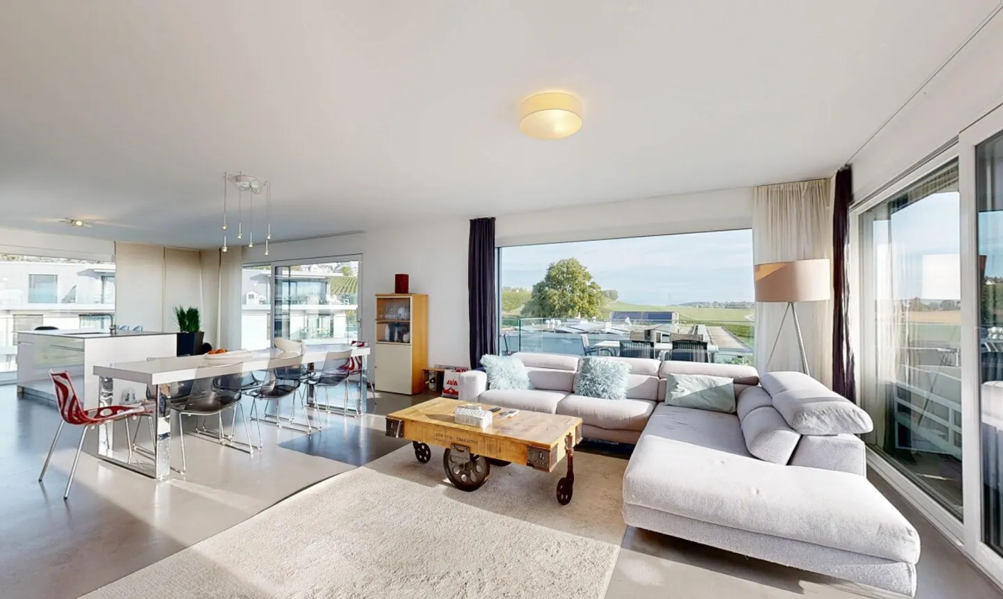 Magnificent penthouse with stunning lake view in Echichens - Photo 3 of 11
