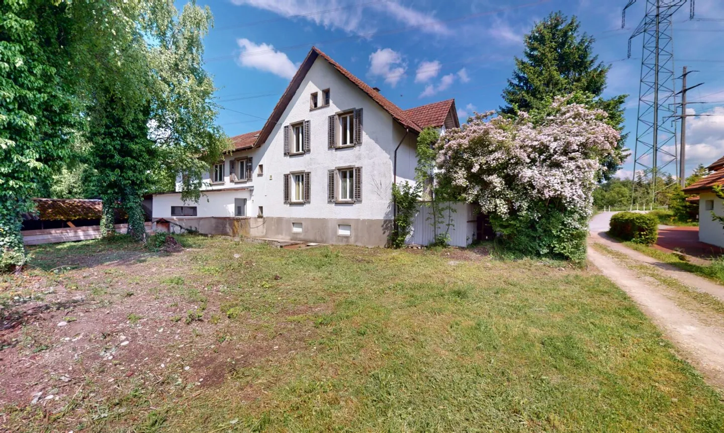 Maison bifamiliale dans la verdure avec un hangar de 400 m² utilisable commercialement - Photo 1 sur 13