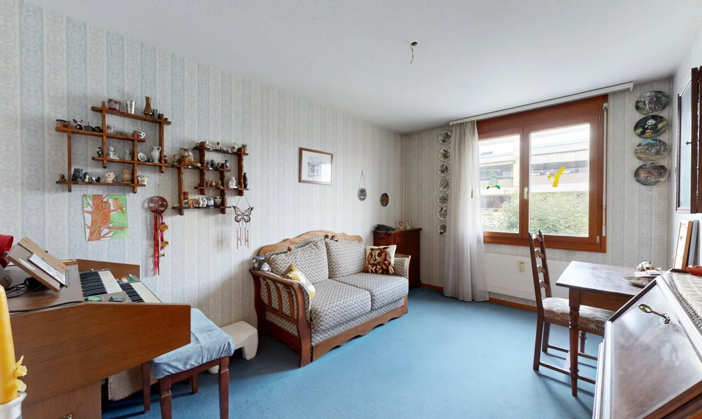 Appartamento soleggiato di 3,5 stanze con balcone e due posti auto - Foto 9 di 13