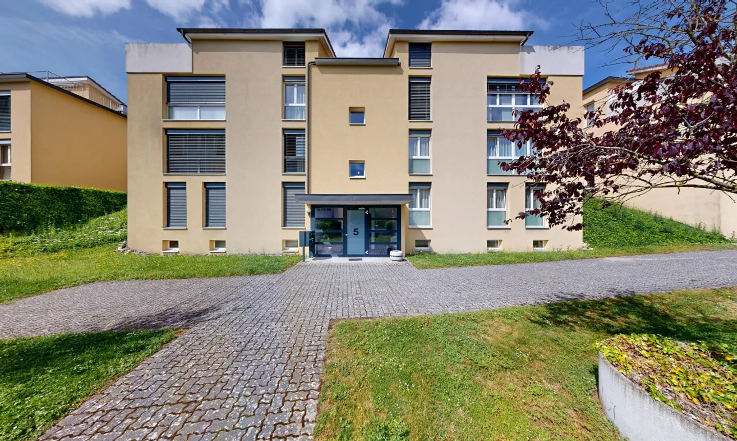 Contemporary duplex with 5.5 rooms and garden in Cortaillod - Photo 1 of 11