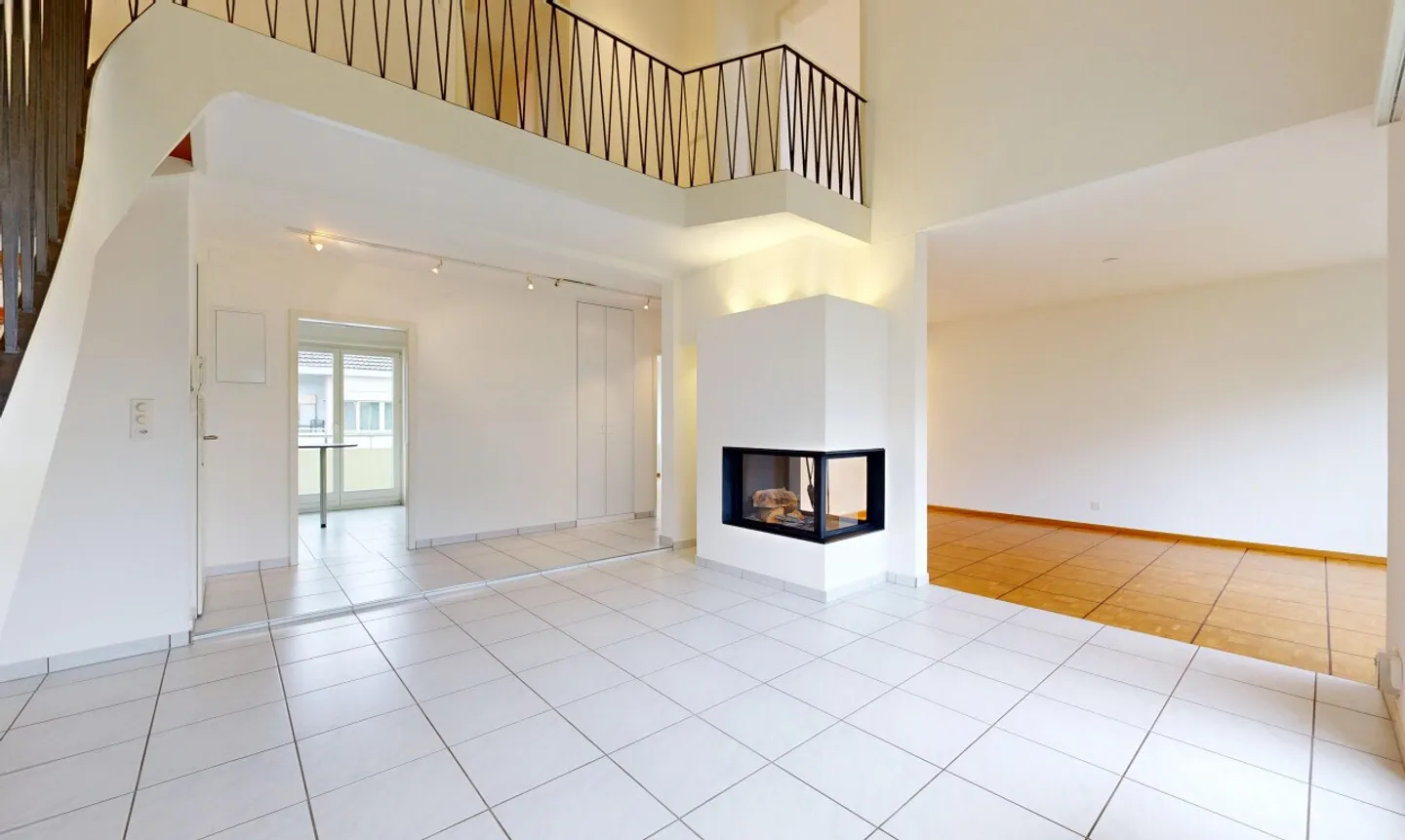 Maisonette attico con tre balconi e giardino privato - Foto 1 di 11