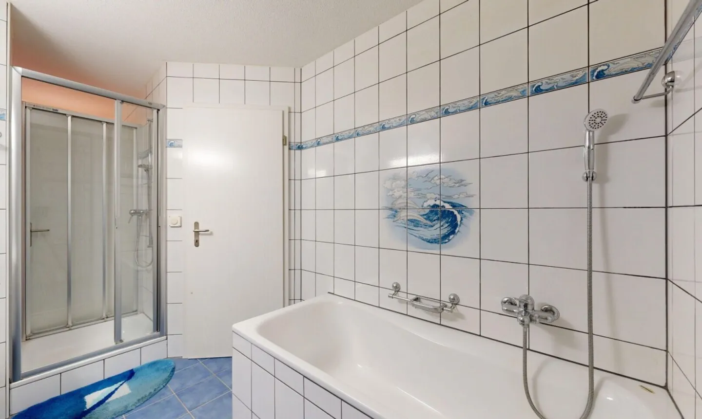 Appartement familial de 4,5 pièces avec jardin - Photo 5 sur 11