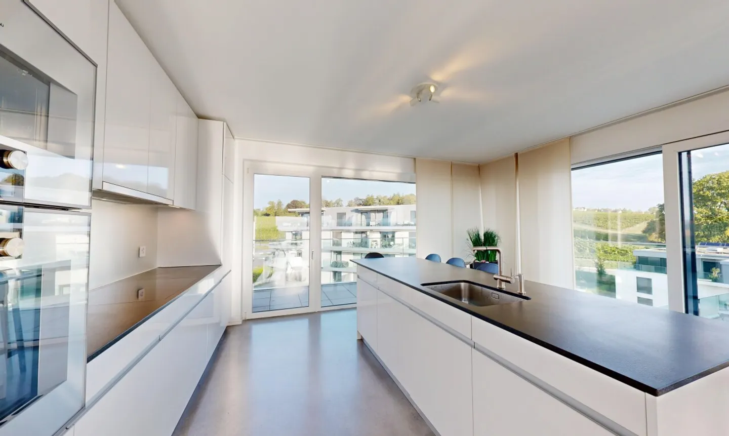 Magnificent penthouse with stunning lake view in Echichens - Photo 7 of 11