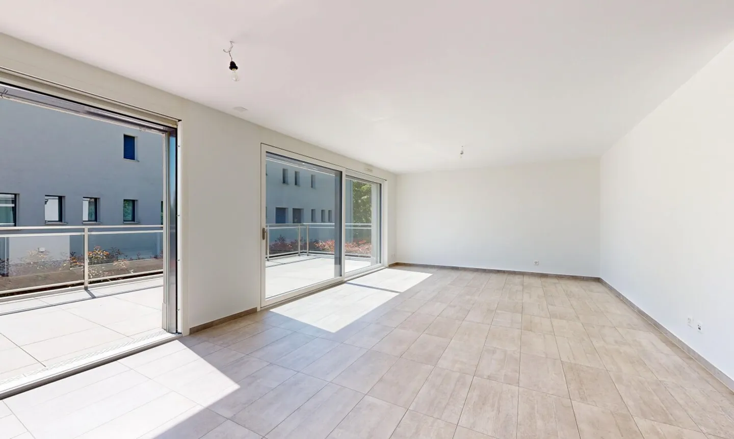 Appartement spacieux avec grande terrasse - Photo 5 sur 11