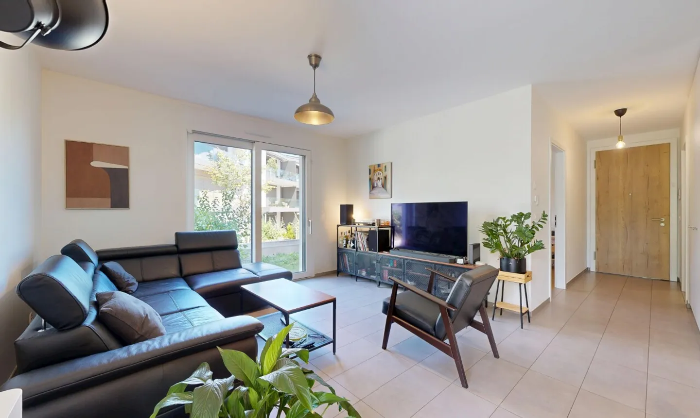 Eine moderne Gartenwohnung in privilegierter Lage in Chambésy - Foto 2 von 11