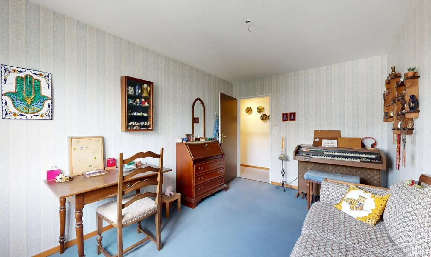 Appartamento soleggiato di 3,5 stanze con balcone e due posti auto - Foto 10 di 13