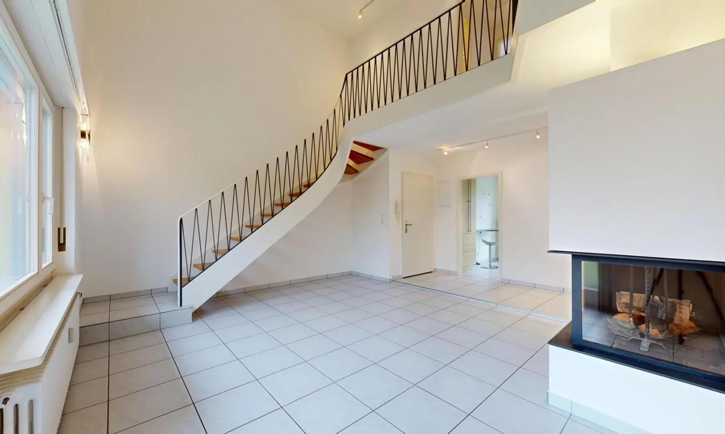 Maisonette attico con tre balconi e giardino privato - Foto 2 di 11