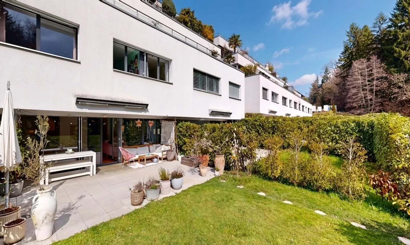Magnificent contemporary duplex with terrace, garden & green setting - Photo 1 of 11