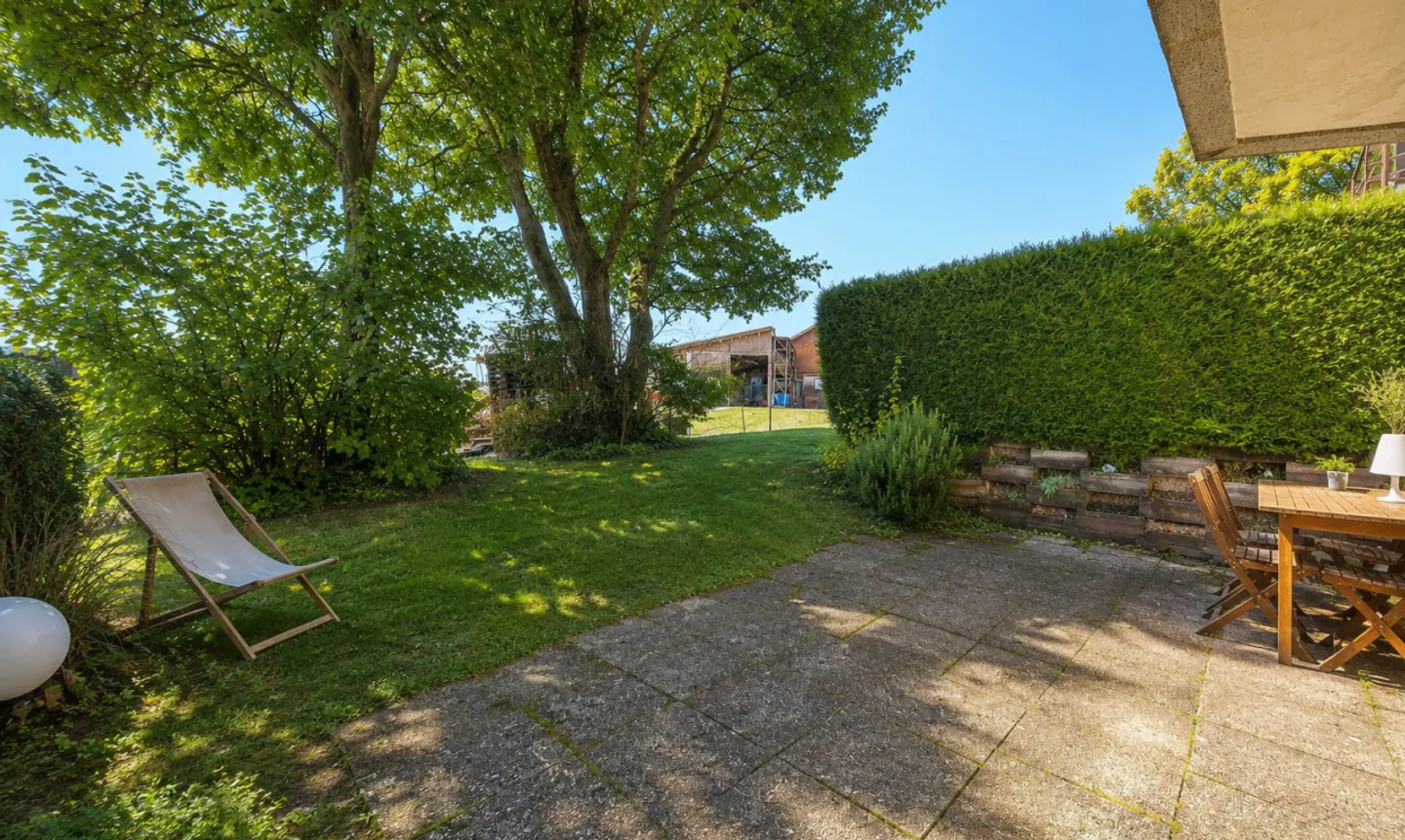 Appartement 3,5 pièces avec jardin dans un cadre verdoyant - Photo 1 of 10