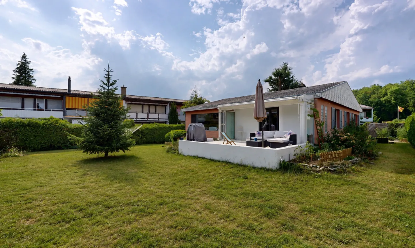 Modernized Single-Family House with Designer Kitchen and Conservatory - Photo 1 of 11