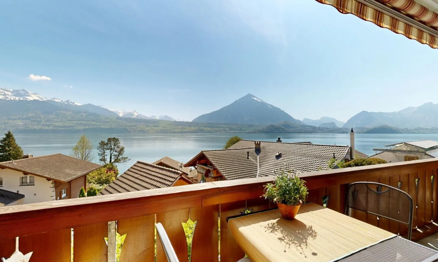 Seesicht, Ruhe und Sonne Ihre 2.5-Zimmerwohnung in Merligen - Foto 1 von 11