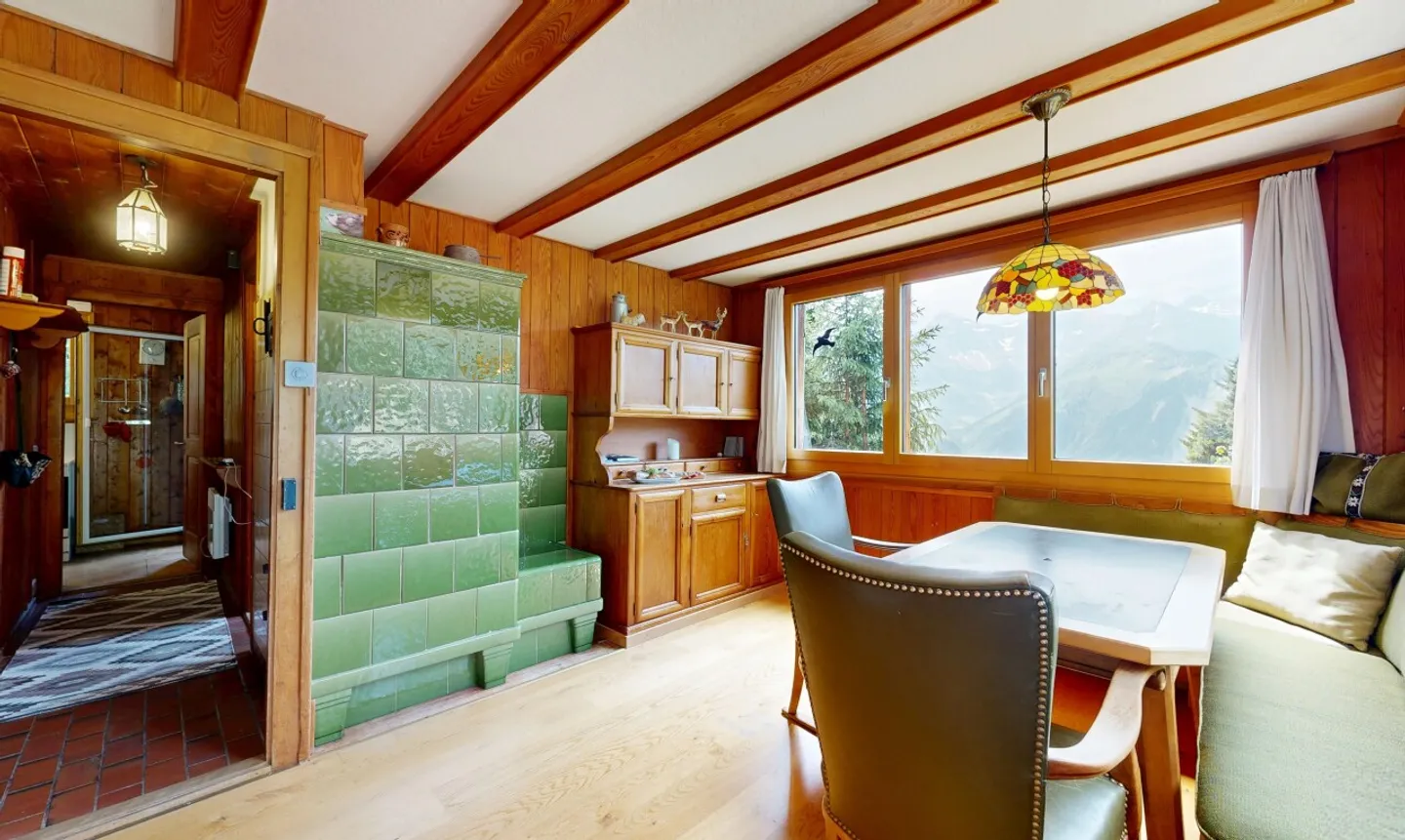 Chalet mit Einliegerwohnung & Bergsicht - Foto 4 von 11