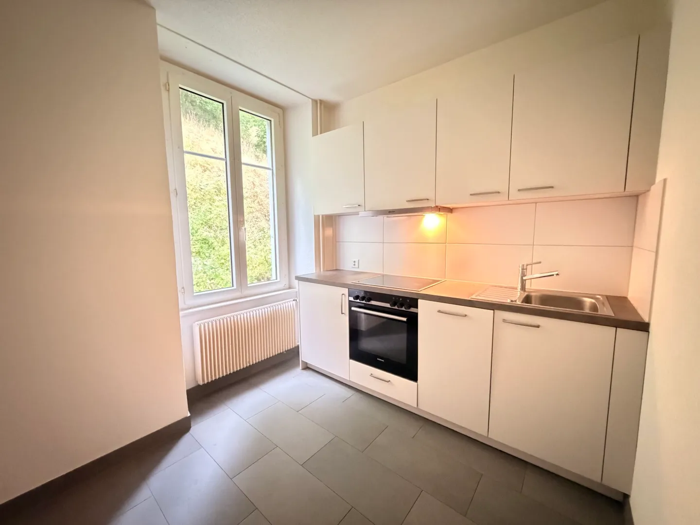 2,5-Zimmer-Wohnung im 1. Stock zu vermieten in Porrentruy - Foto 1 von 6