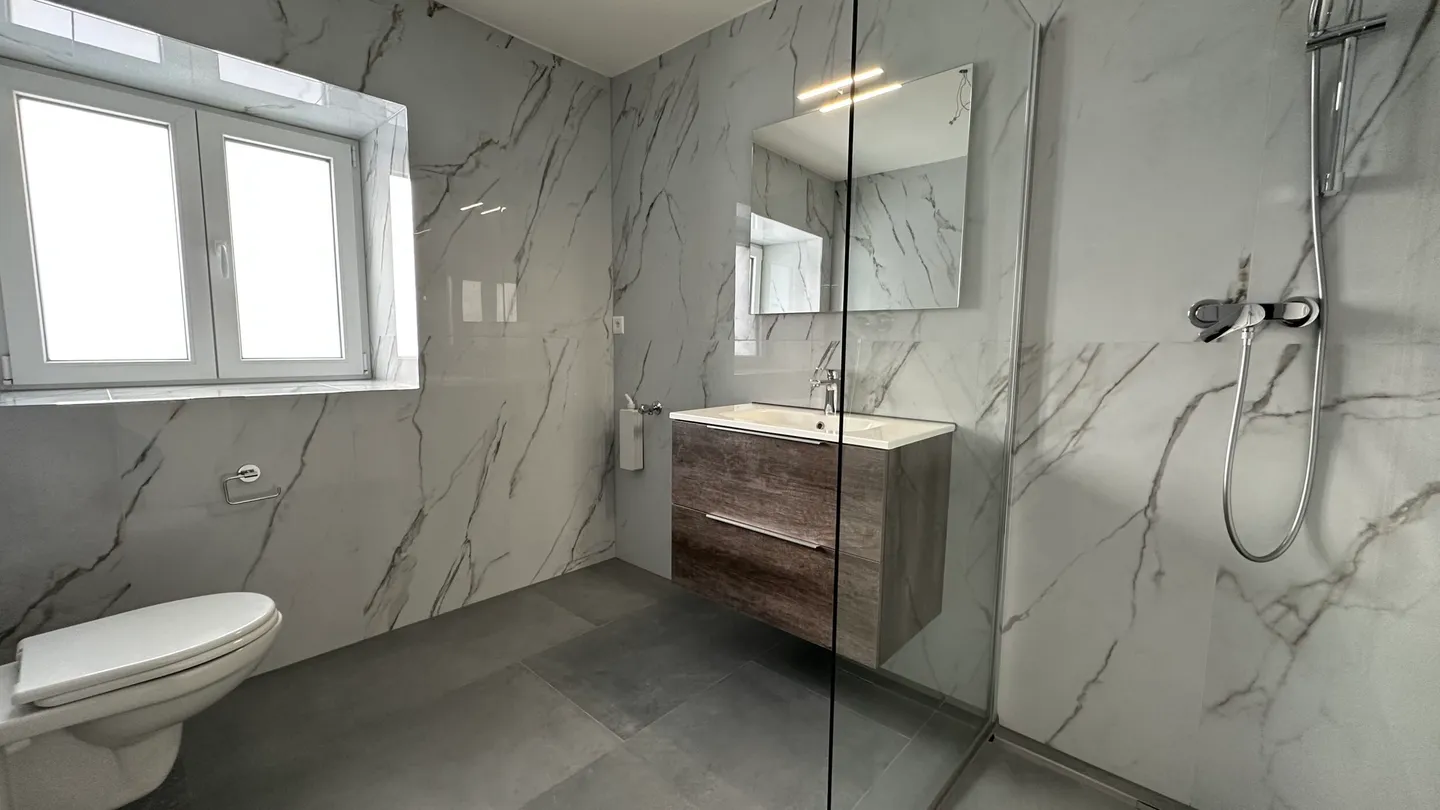 Appartement rénové au rez-de-chaussée - Photo 6 sur 10