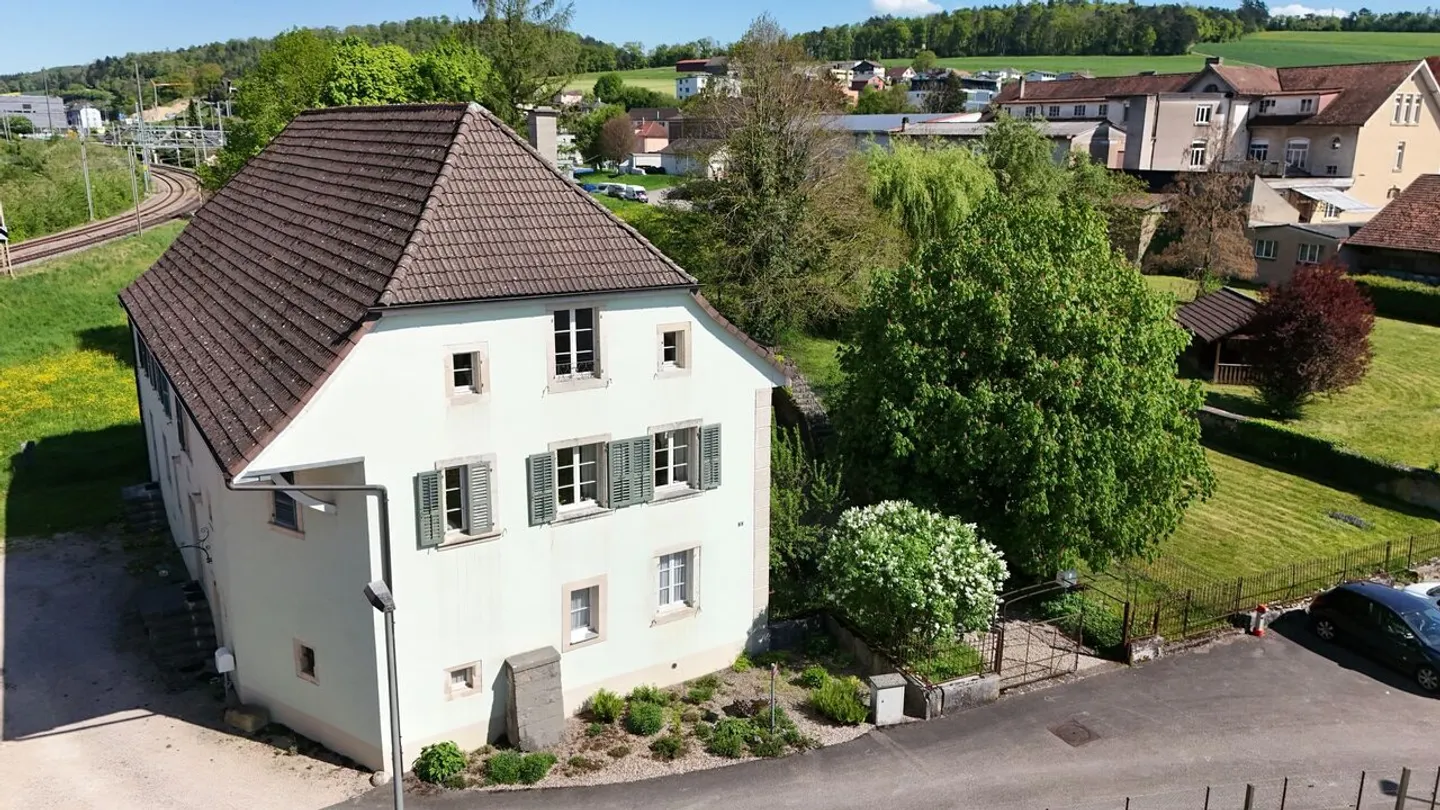 Maison locative de 2 logements à vendre dans la ville de Porrentruy - Photo 1 sur 13