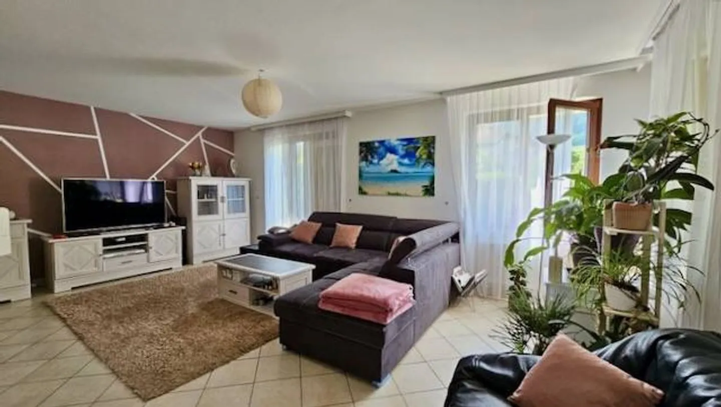 Chaleureuse maison, dans un agréable quartier résidentiel, garage double, places de parc - Foto 8 von 13