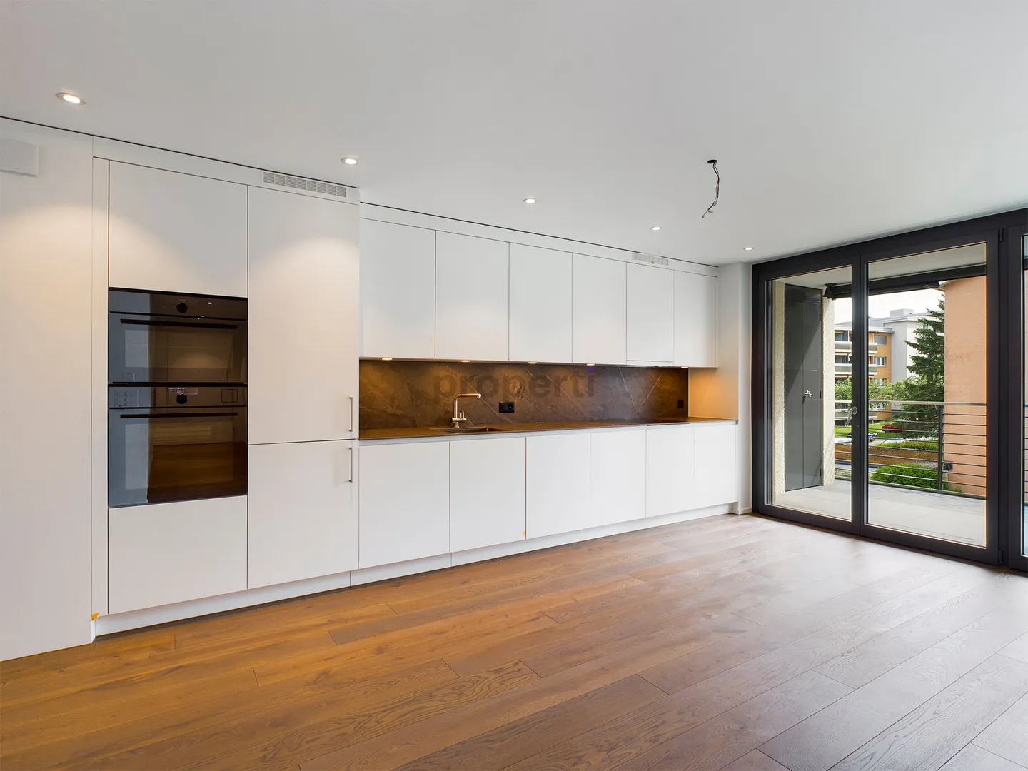 Bijou résidentiel avec grande loggia et confort moderne à Zurich-Witikon - Photo 2 sur 8