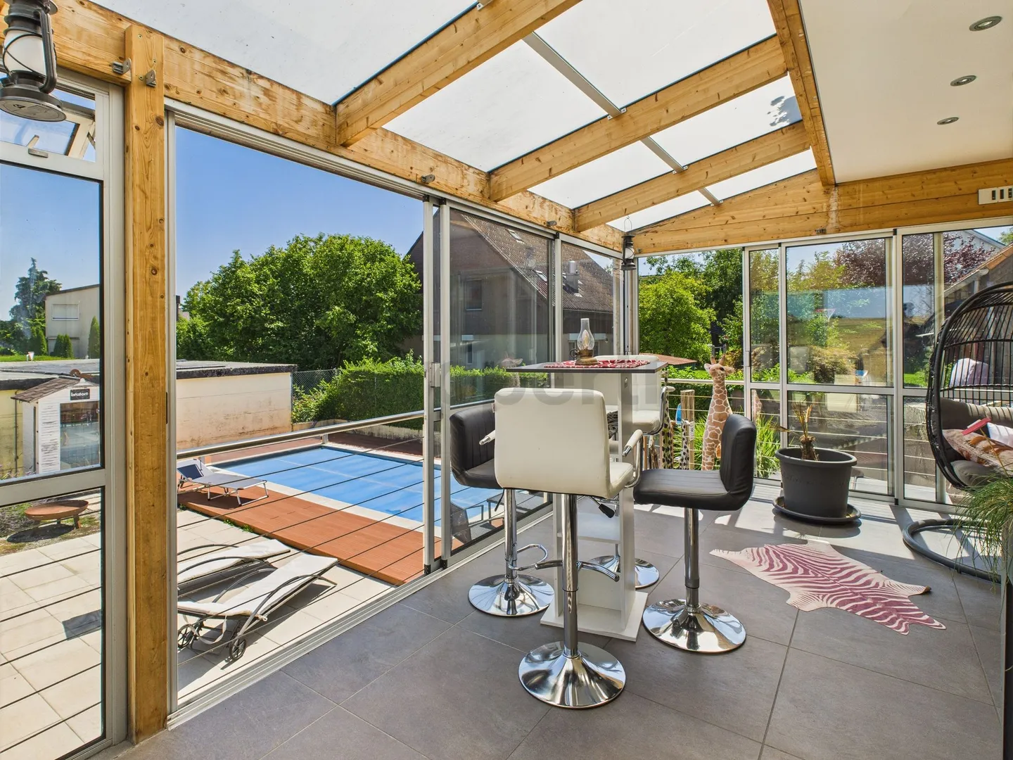 4.5-Zimmer-Parterrewohnung mit Wintergarten, Gartenparadies und Pool in Uettligen - Foto 8 von 10