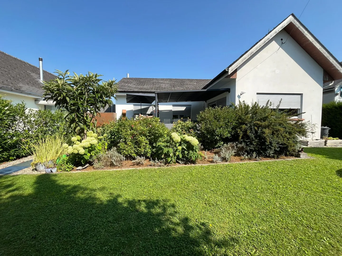 Charmante maison individuelle de 5,5 pièces avec jardin à Herzogenbuchsee, canton de BE - Photo 1 sur 13