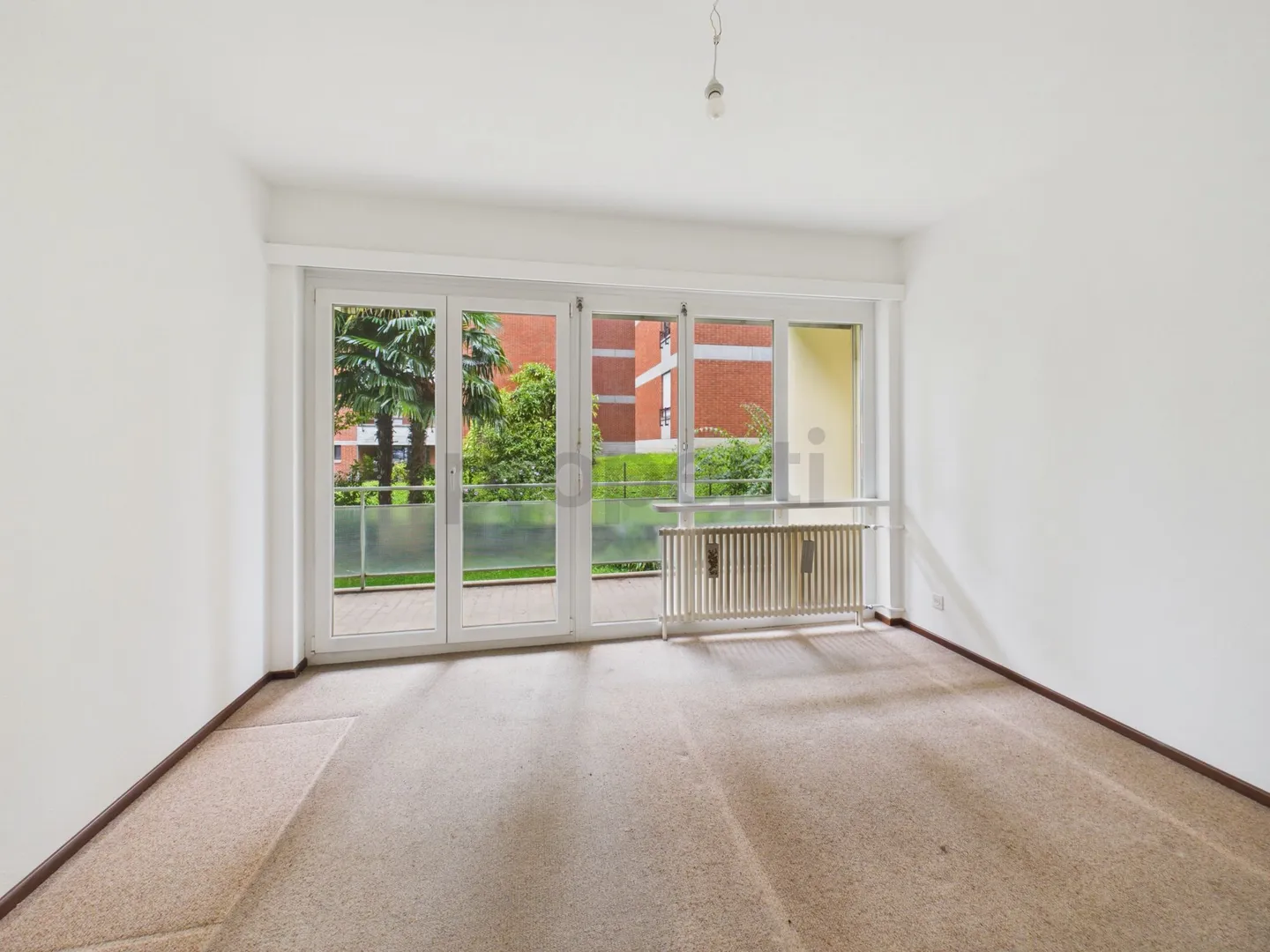 Quiet 2.5-room apartment in Agno / Second home possible - Photo 4 of 8