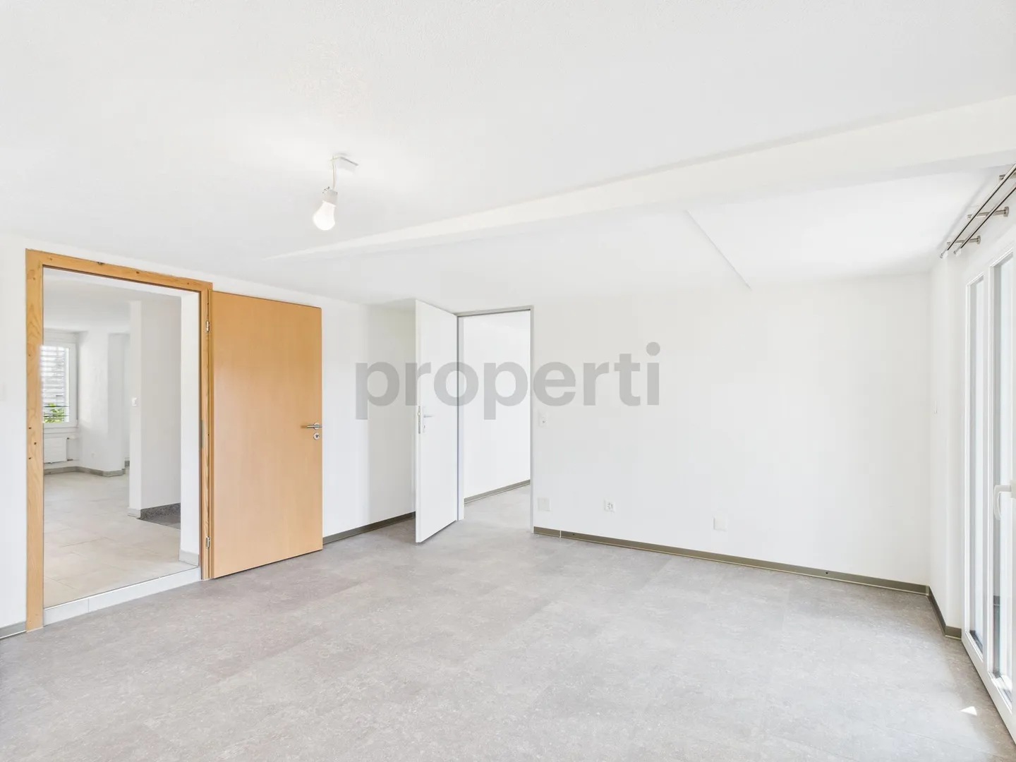 Charming and Sunny Home in the Green with this 3.5-Room Apartment in Ebnat-Kappel - Photo 1 of 12