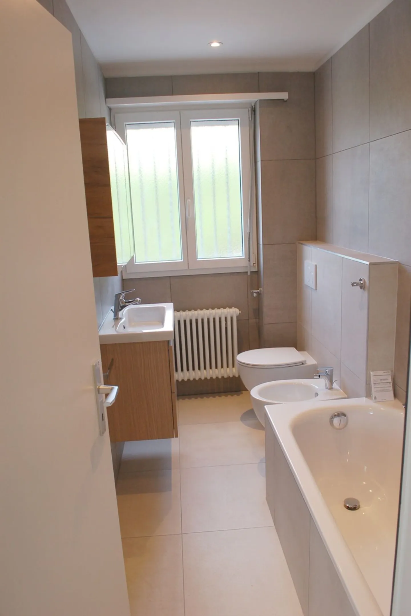 Charmantes und geräumiges unabhängiges Zweifamilienhaus mit Garten in Lugano - ideal auch für berufliche Aktivitäten - Foto 10 von 13