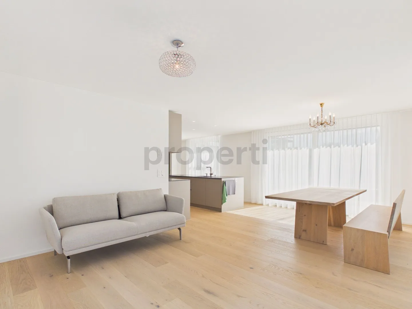 Modern 3.5-Room Furnished Apartment with 2 Balconies, with Lake and Mountain View in Pfäffikon ZH - Photo 2 of 12