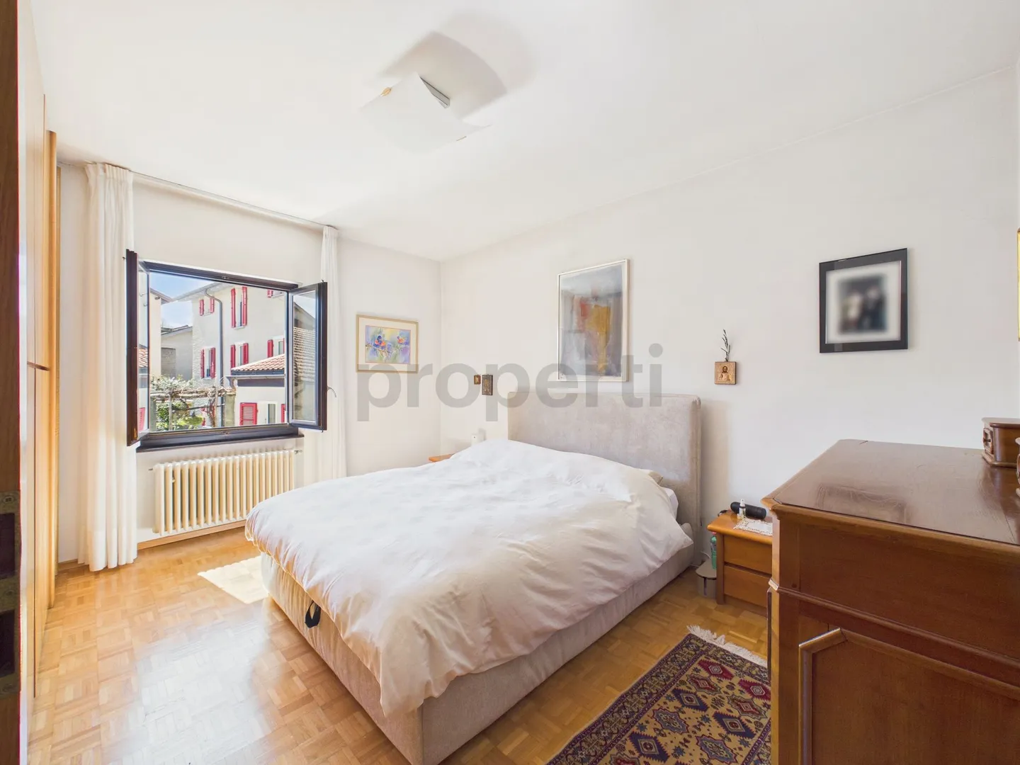 Elegantes Einfamilienhaus mit 4,5 Zimmern und Garage im Zentrum von Gravesano - Foto 7 von 13