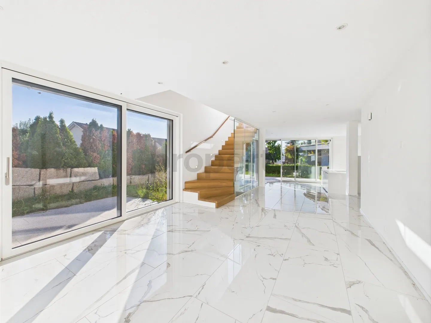 Family-friendly single-family home with sunny garden and modern design in Urdorf - Photo 2 of 12