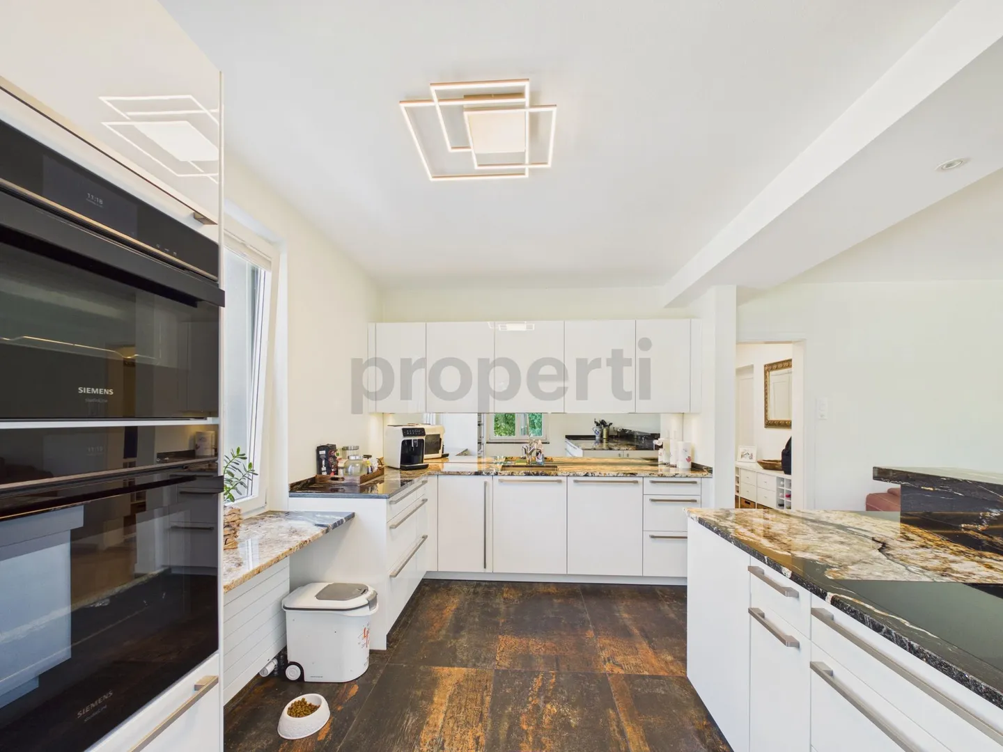 Appartamento elegante di 4,5 stanze con interni di alta qualità - Foto 4 di 13