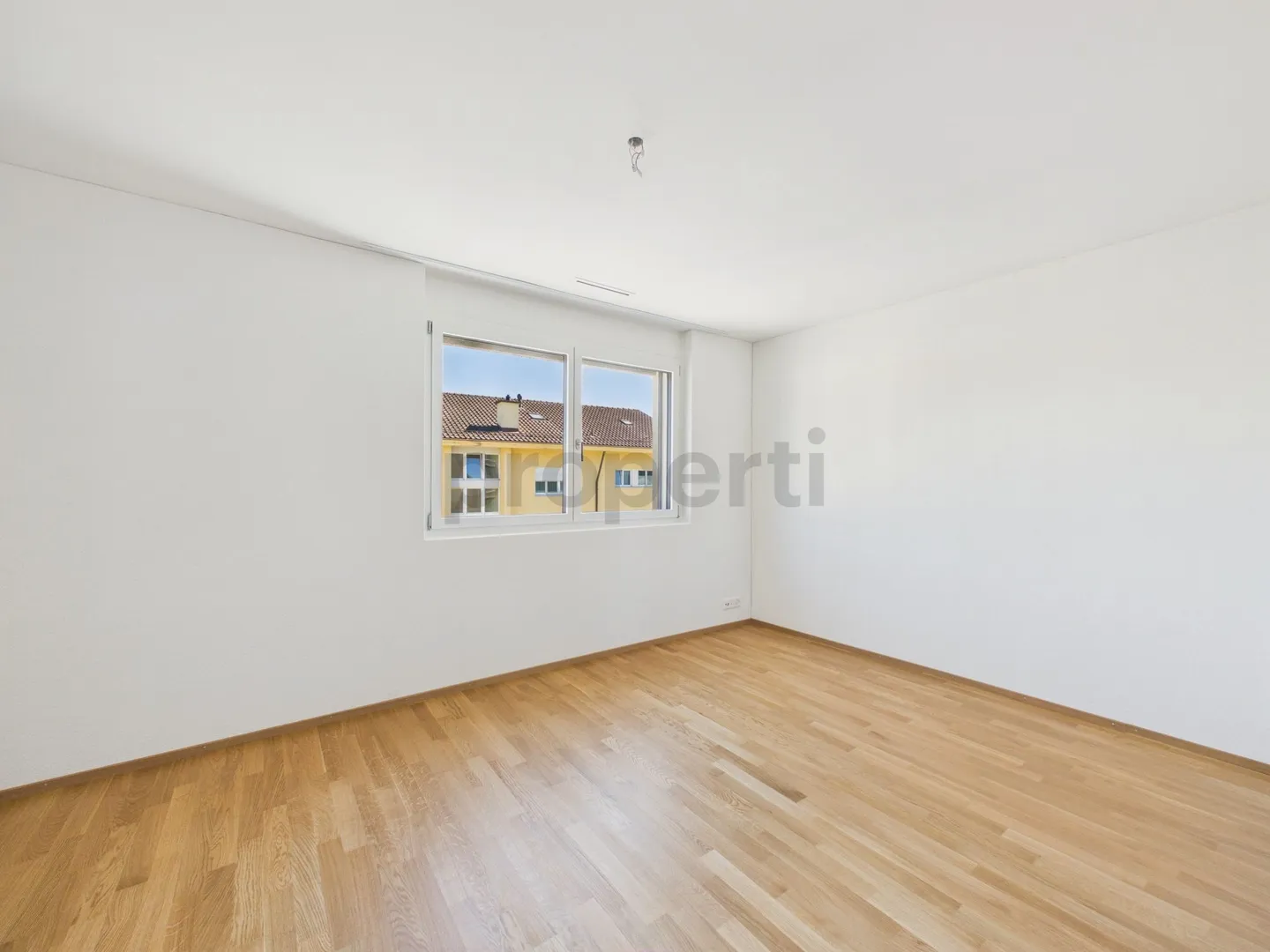 Balcon ensoleillé, standard Minergie, ascenseur et connexion parfaite aux transports en commun ! - Photo 4 sur 7