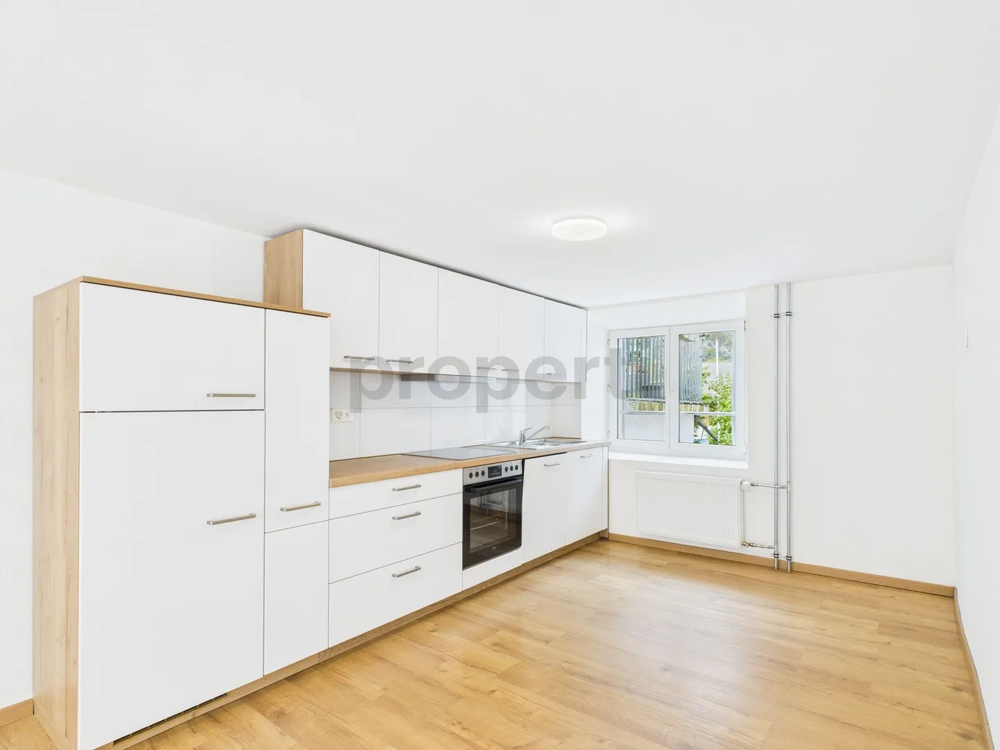 Spacious Corner Townhouse with Studio, Sunny Balcony and Mountain View - Photo 2 of 12