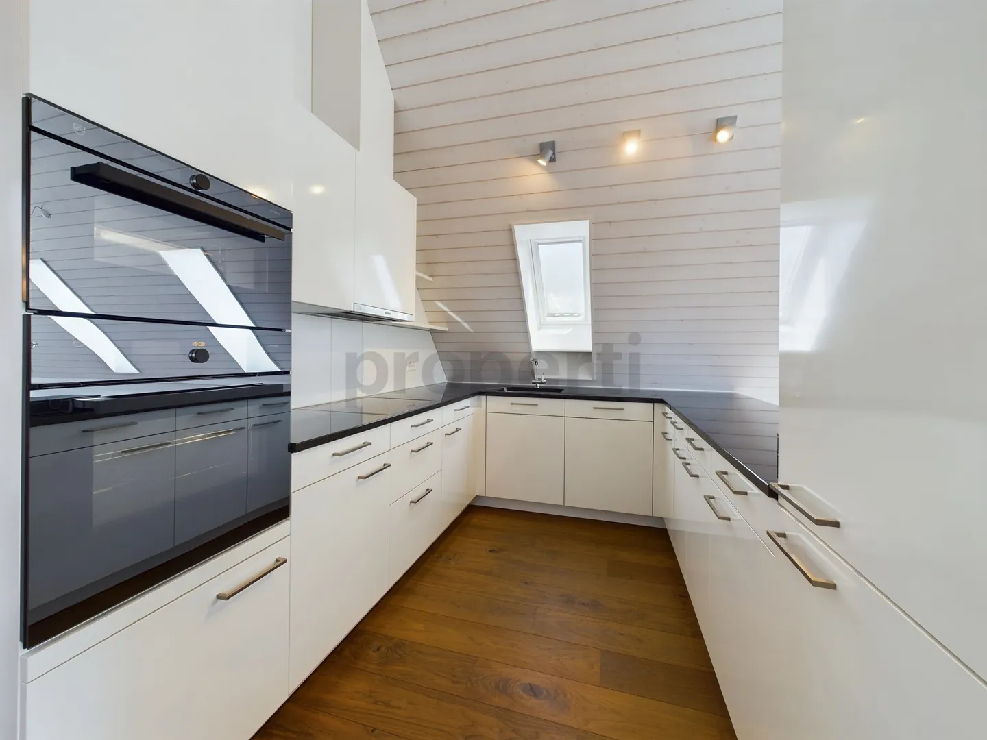 Stylish and Cozy 3.5-Room Attic Apartment with Fireplace in Niederglatt - Photo 2 of 11