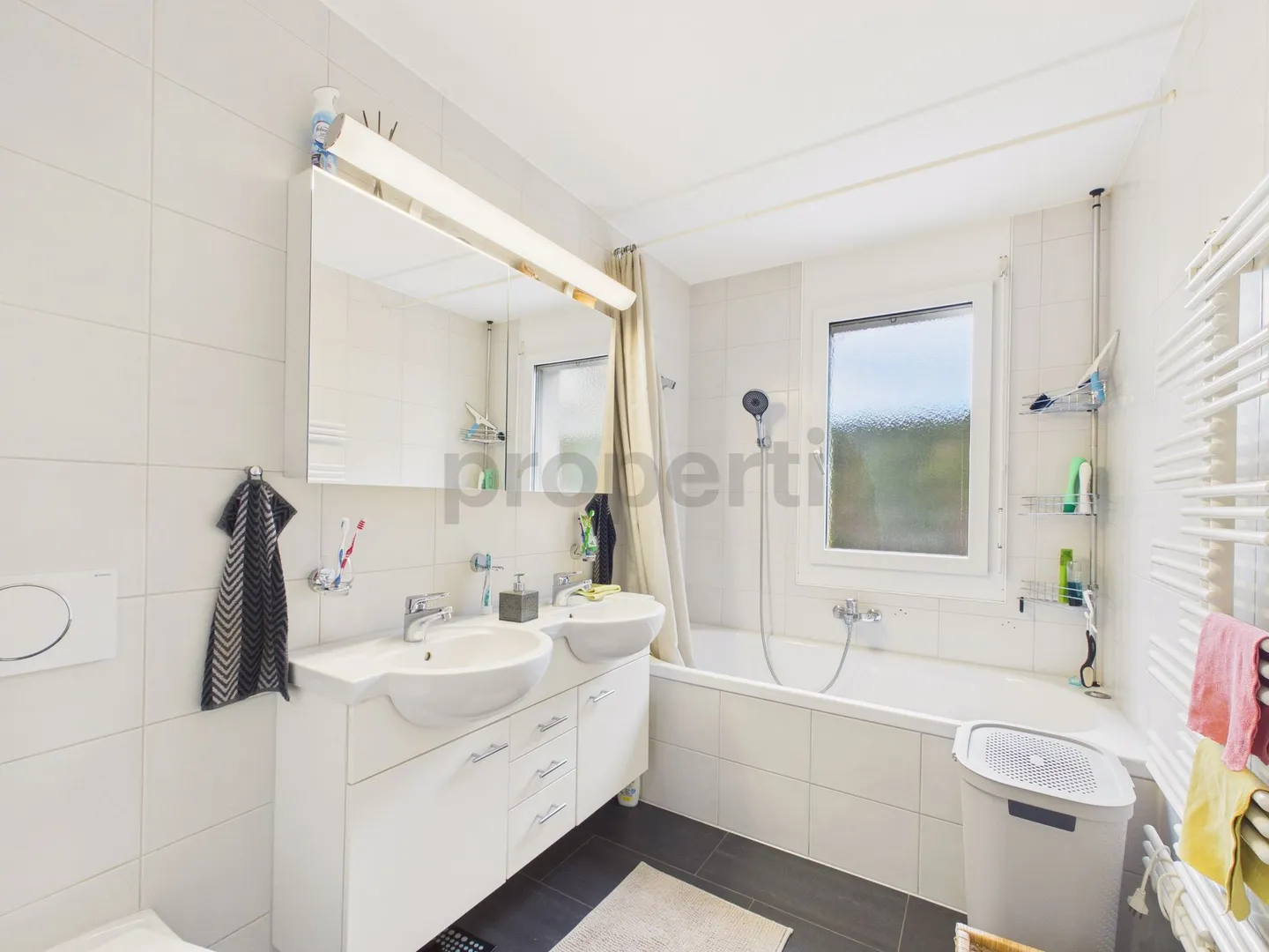 Moderne 5.5-Zimmer Wohnung mit Garten - Foto 10 von 13