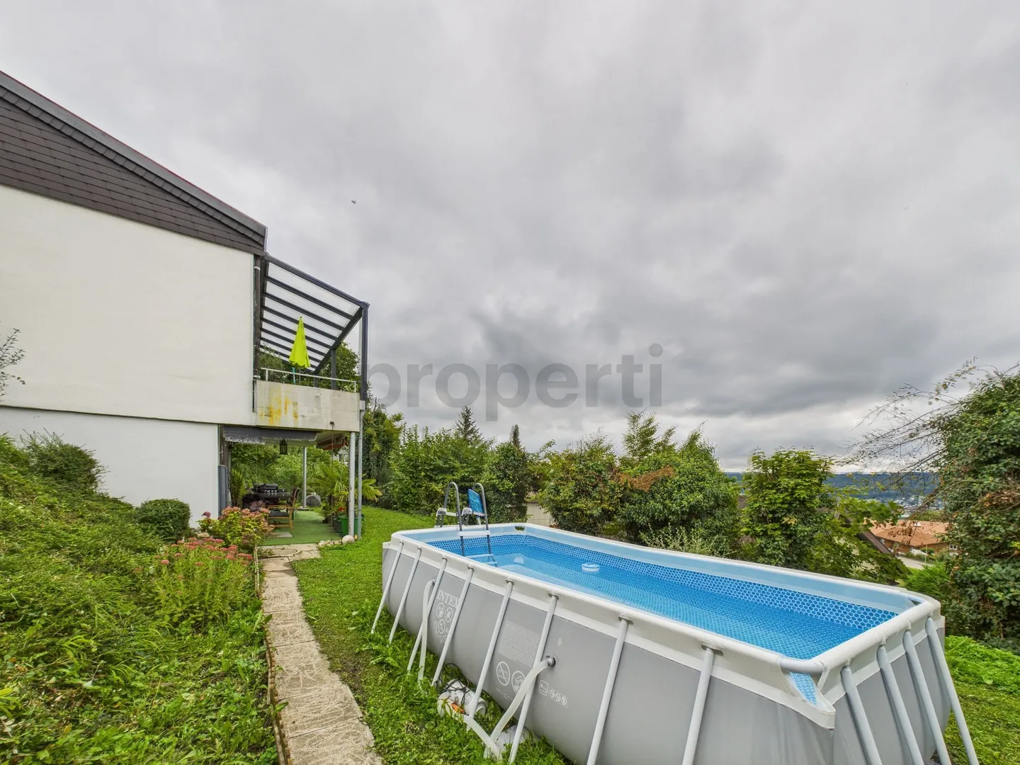 Inviting 6.5-room single-family house with three residential units and large plot in Boppelsen - Photo 10 of 13