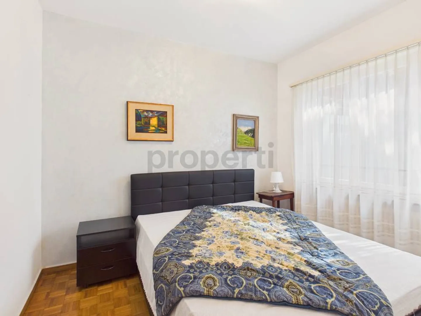 Doppelhaushälfte mit Panoramablick auf den Luganersee und privatem Garten in Bissone - Foto 10 von 13