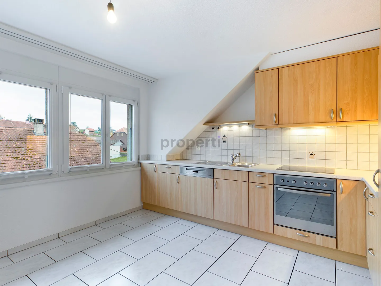 Light-Filled Attic Apartment with Sunny South Balcony - Photo 2 of 8