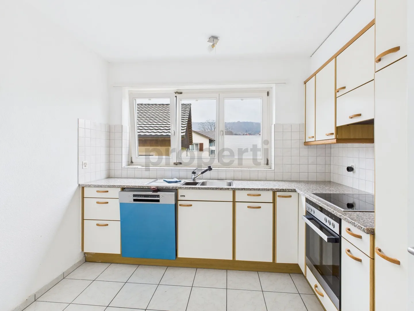 Gepflegtes Mehrfamilienhaus in ruhiger Lage in Full-Reuenthal - Foto 5 von 10